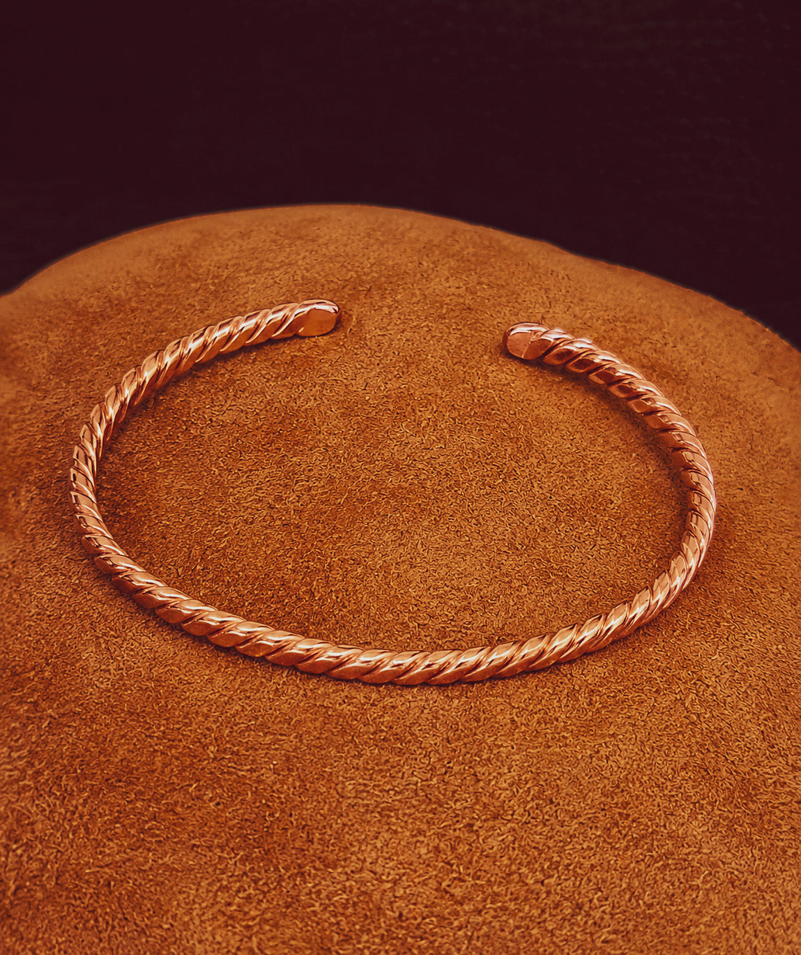 Hand forged Twined copper cuff with a fine, tightly woven twist.