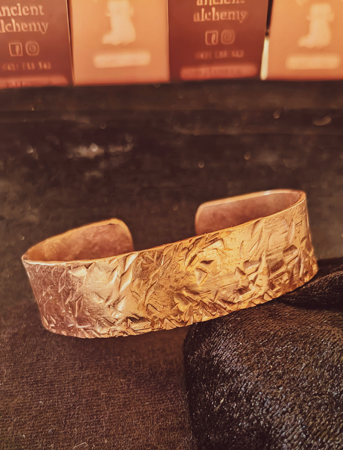Hand forged copper cuff with textured hammered finish.