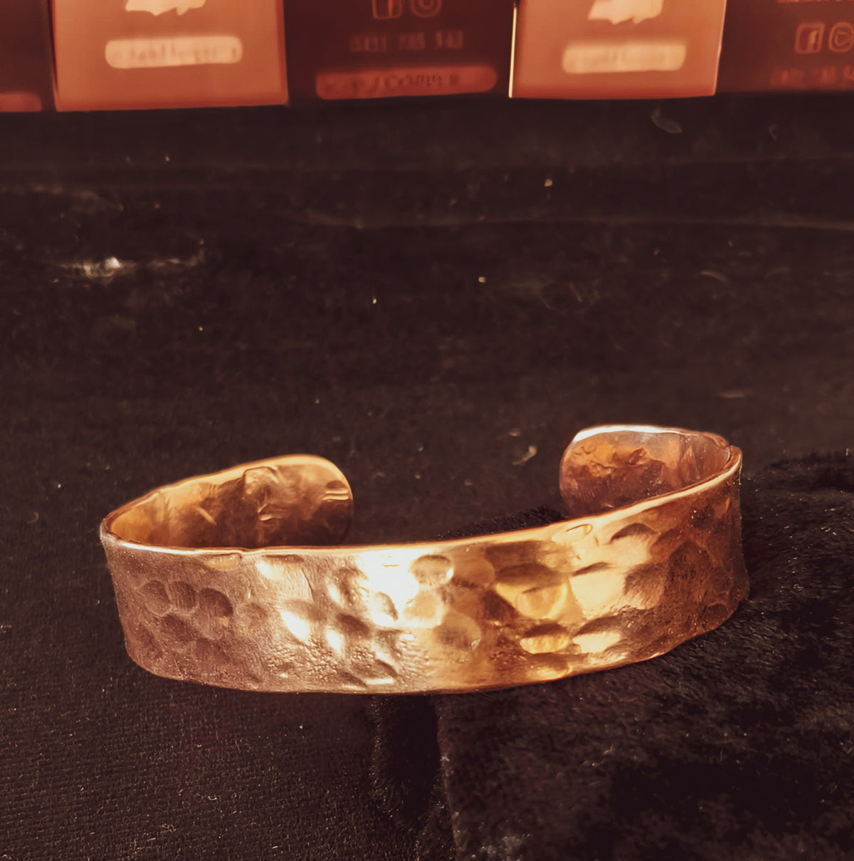 Hand forged copper cuff with textured hammered finish.