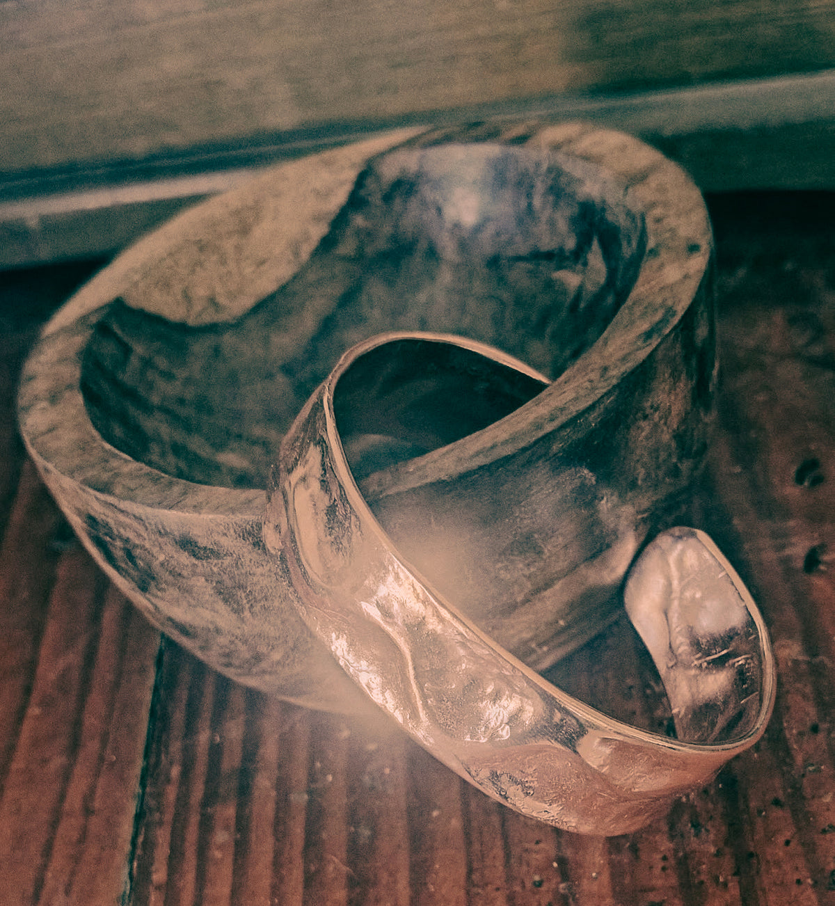 Hand forged copper cuff with organic hammered texture.