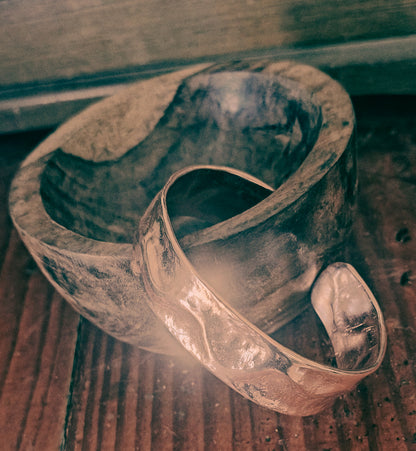 Hand forged copper cuff with organic hammered texture.
