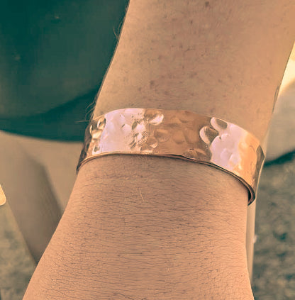 Hand forged copper cuff with organic hammered texture.